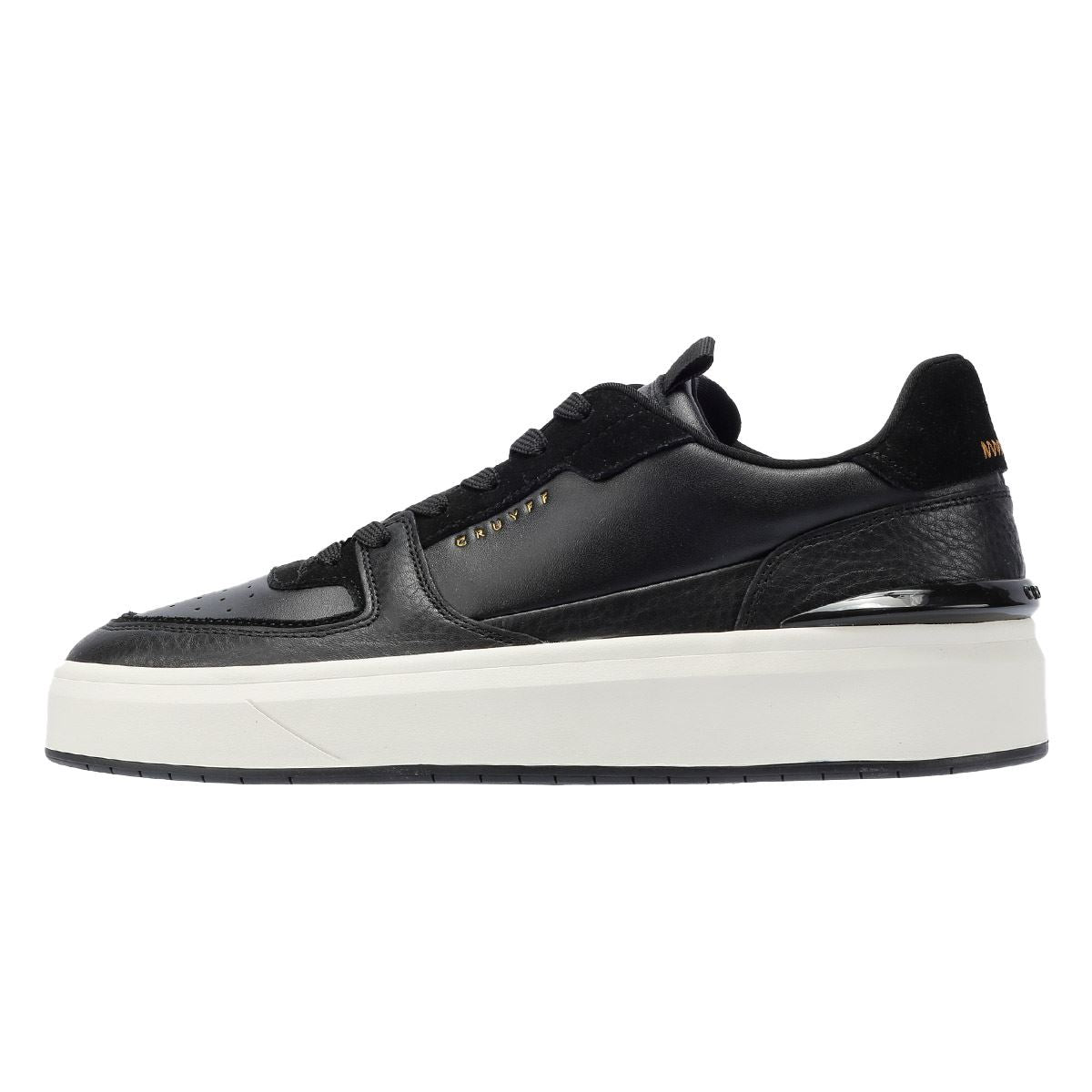 Cruyff Surefire Tennis Baskets noires en cuir pour hommes
