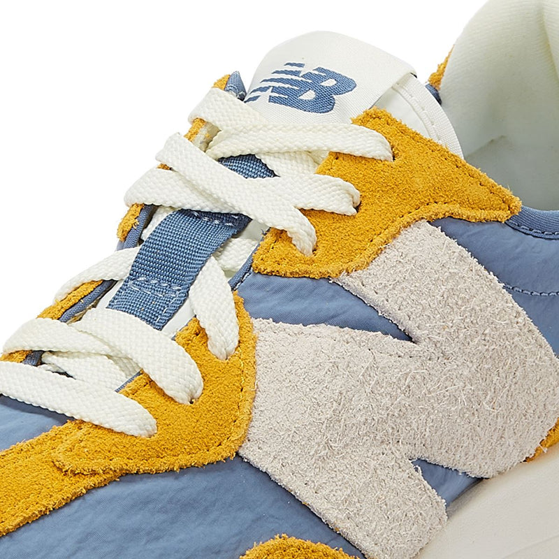 New Balance 327 Baskets Dorées Pour Femmes